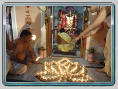 Sandhi Puja lamps decorated as lotus at Baghbazar Haldarbari